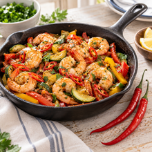 Spicy shrimp and vegetable skillet prepared with fresh Cayenne Long Slim peppers
