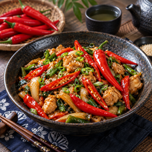 Japanese-style chicken stir-fry prepared with sliced red Japanese Sapporo hot peppers and vegetables.