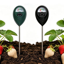 Green analog soil moisture meter with a single probe inserted into soil.