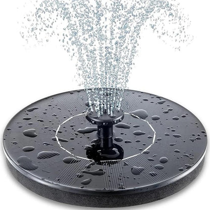 Solar-powered fountain pump creating a water feature in a bird bath