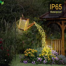 garden watering can lantern glowing water effect