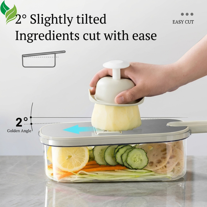 Angled vegetable slicer cutting cucumber into a clear collection container