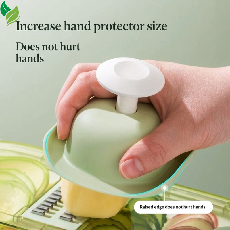 Large hand protector gripping a potato above the vegetable slicer